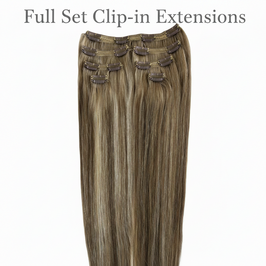 Set of hair extensions with clips on a white background