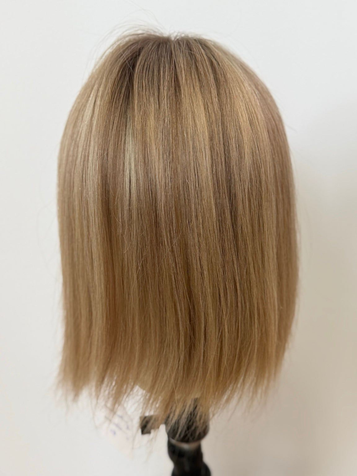 Isabelle 12-inch light ash blonde European full lace wig, back view