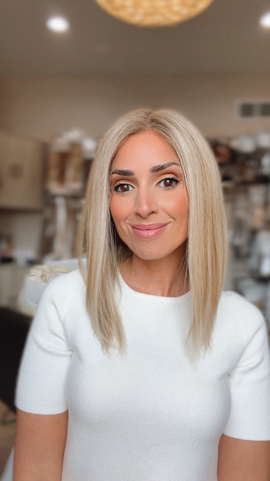 Isabelle 12-inch light ash blonde European full lace wig, model view