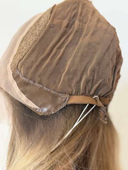 Juliana interior side view with silicone ear area and adjustable strap