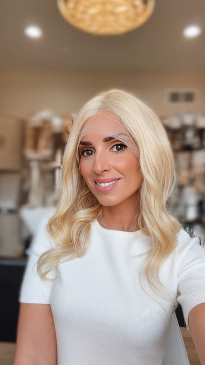 Monica 16-inch platinum blonde wig modeled by Jewell