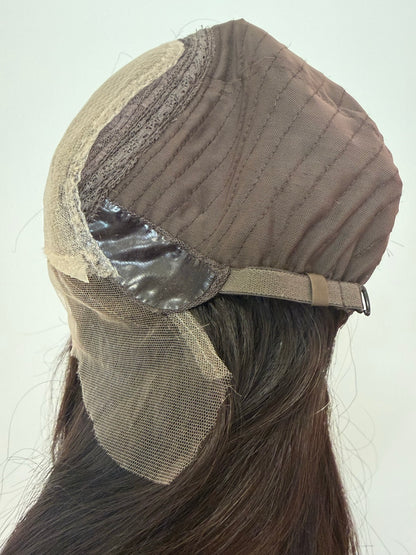 Terese dark brown wig with subtle peekaboo highlights, side cap